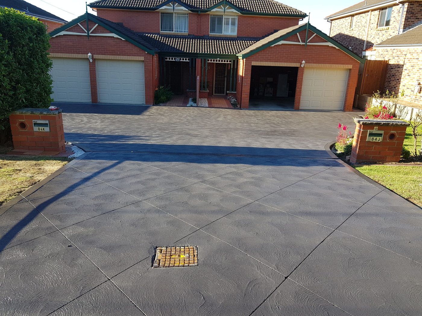 Coloured concrete finish on a Sydney driveway