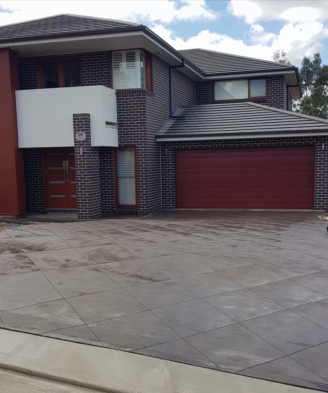 New concrete driveway on a Sydney home by Masta Concrete