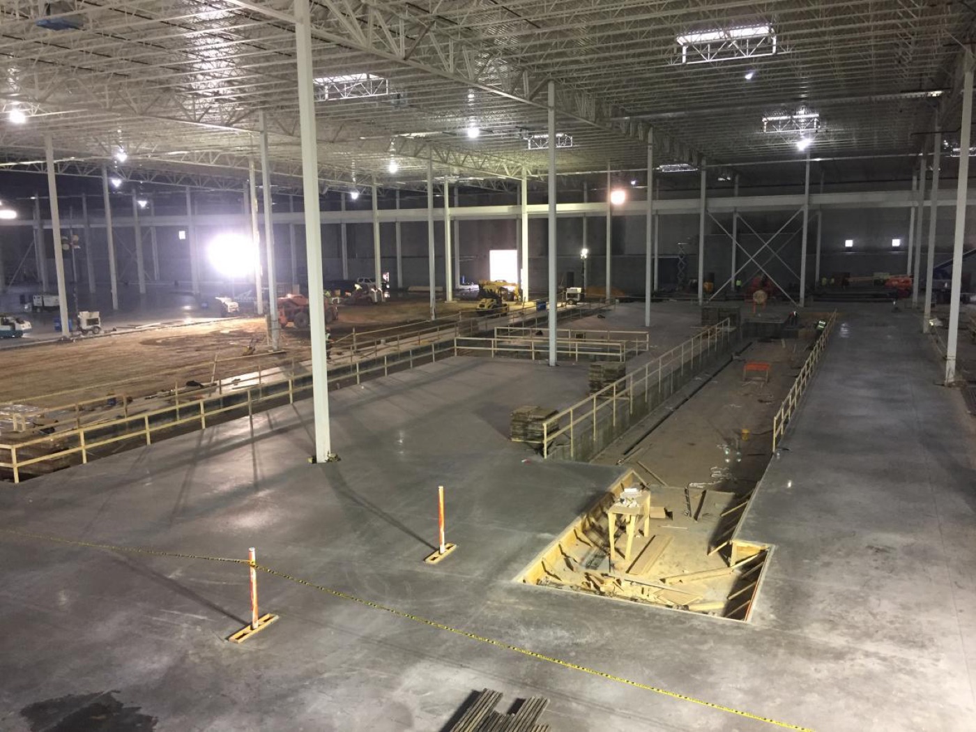 Large warehouse interior with finished concrete floor and loading dock, Sydney