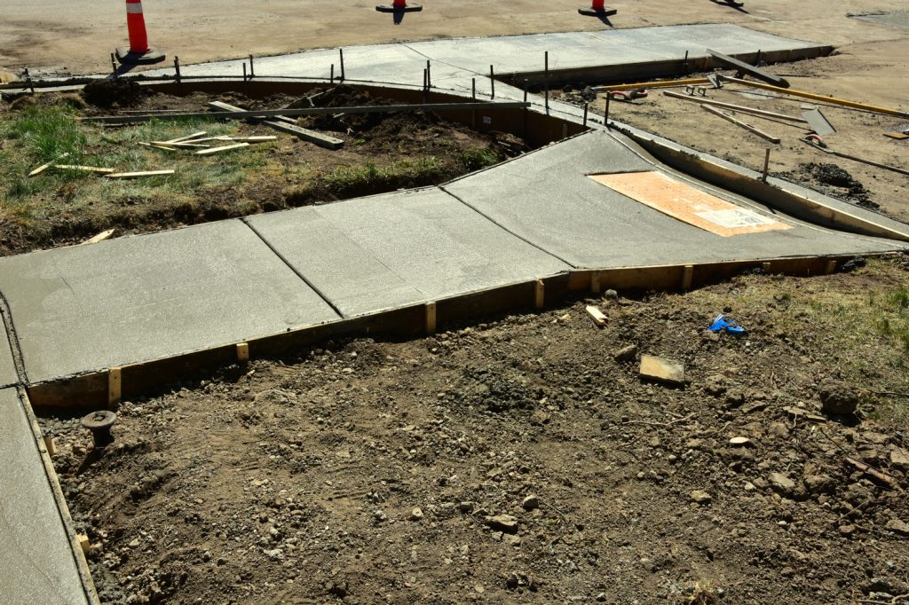 Recently,Poured,Concrete,For,Sidewalks,And,Curb,And,Gutter.